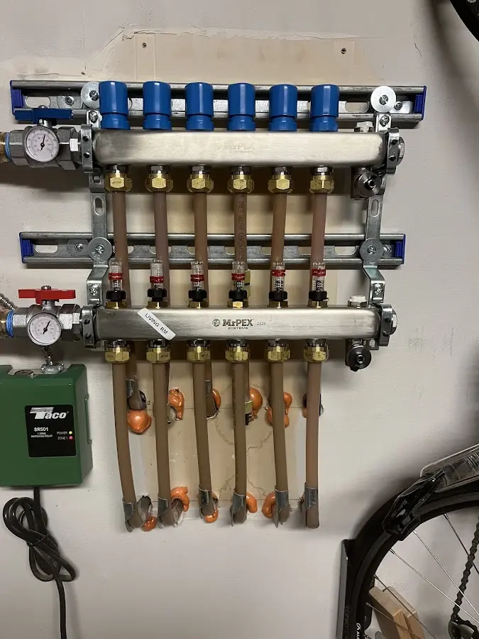 Plumber performing Gas Line Installation at a residential property in Chelan